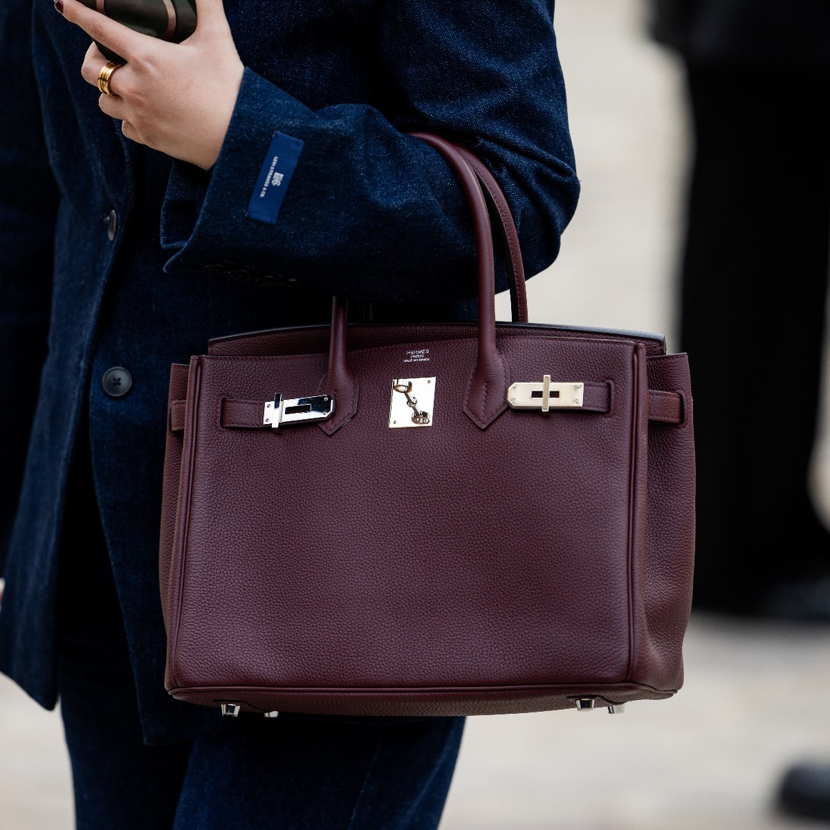 This season belongs to burgundy, and your handbag is no exception