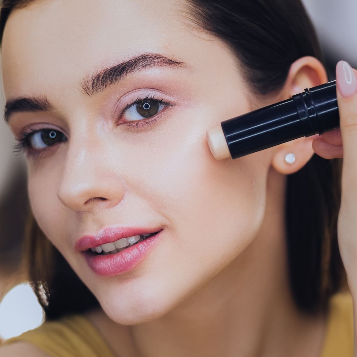 Multi-use makeup sticks are the ultimate carry-on flex