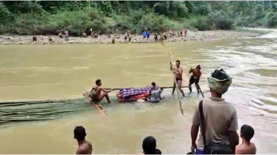 Manipur sick man ferried across flooded Barak River Manipur sick man ferried across flooded Barak River