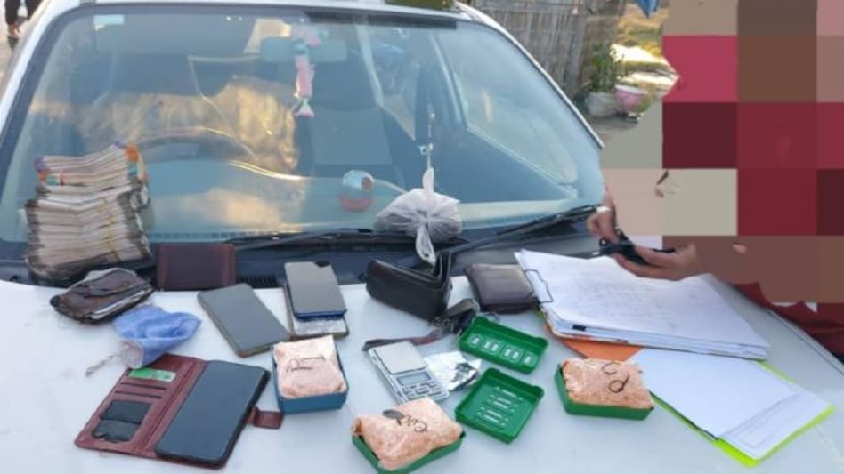Seized drugs along with cash Seized drugs along with cash