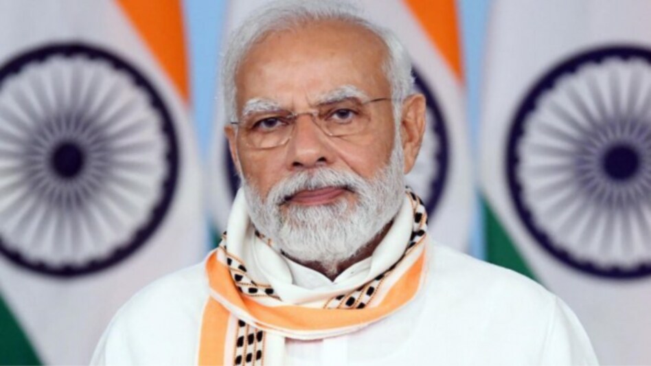 Poll official suspended for 'defacing' PM Modi's photo Poll official suspended for 'defacing' PM Modi's photo