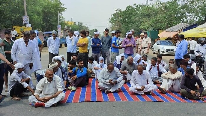 रेवाड़ी में किसानों ने विरोध प्रदर्शन कर सड़क जमा कर दिया