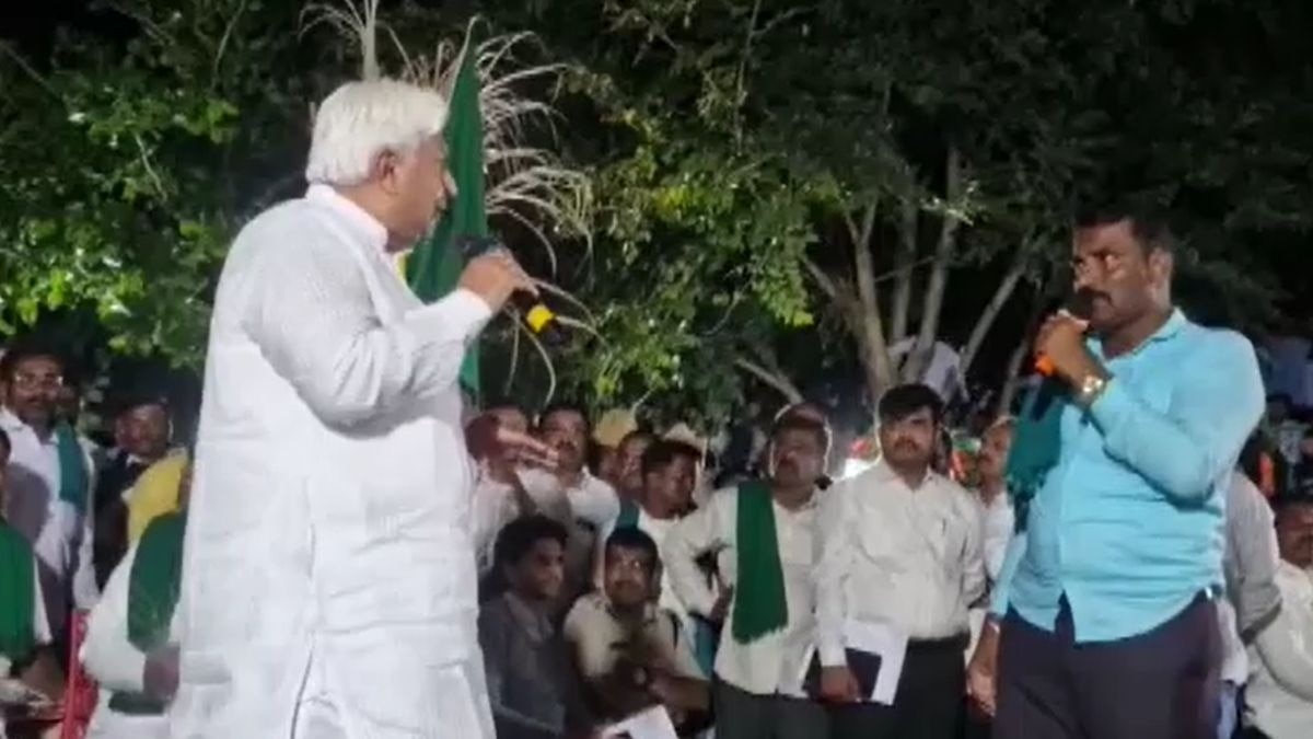 Karnataka Law Minister Patil meeting agitating farmers
