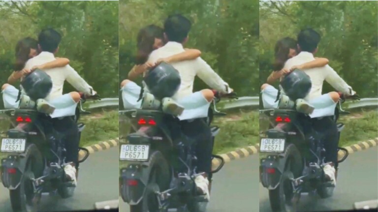 चालत्या बाइकवर कपलचे सुरू होते अश्लील चाळे, पण पुढच्या क्षणीच मिळाला मोठा धडा! Couple Romantic Video Viral