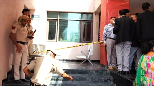 A woman suffered injuries after a shooter, disguised as a lawyer, fired shots at the Saket district court on Thursday.