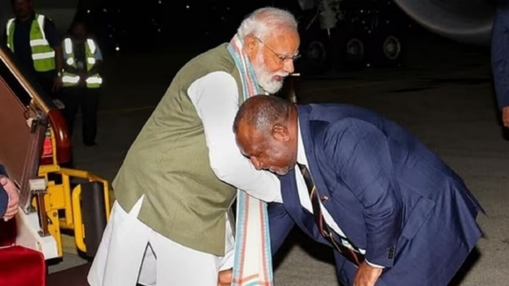papua new guineas pm specializes in defeating political opponents know james marape who touched pm modis feet