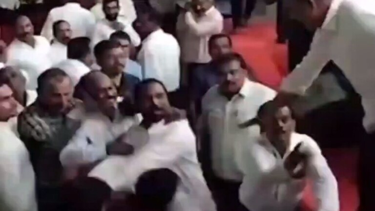गुरुजी तुम्ही सुद्धा! सांगलीत भर सभेत शिक्षकांचा राडा, स्टेजवर फेकली अंडी Sangli District Primary Teachers Bank meeting Controversy incident of fighting over egg throwing
