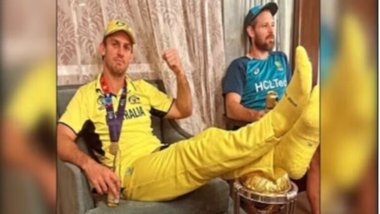 Australia : वर्ल्ड कप विजयाचा माज, ट्रॉफीवरच ठेवला पाय! मिचेल मार्शच्या कृतीने पेटला वाद mitchell marsh viral pic his feet up on world cup gets troll in social media ind vs aus final pat cummins