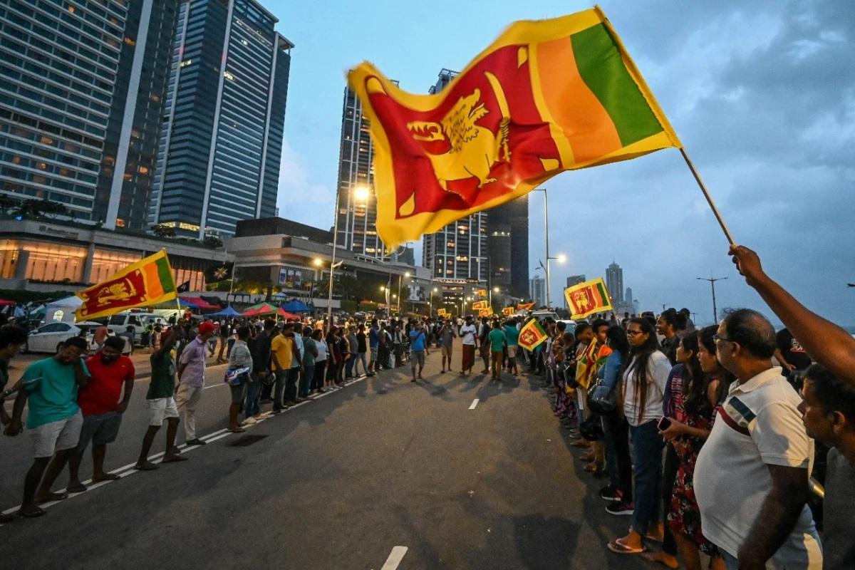 Anti-government demonstrators take part in a protest near the President's office in Colombo on May 10. (Photo: AFP)