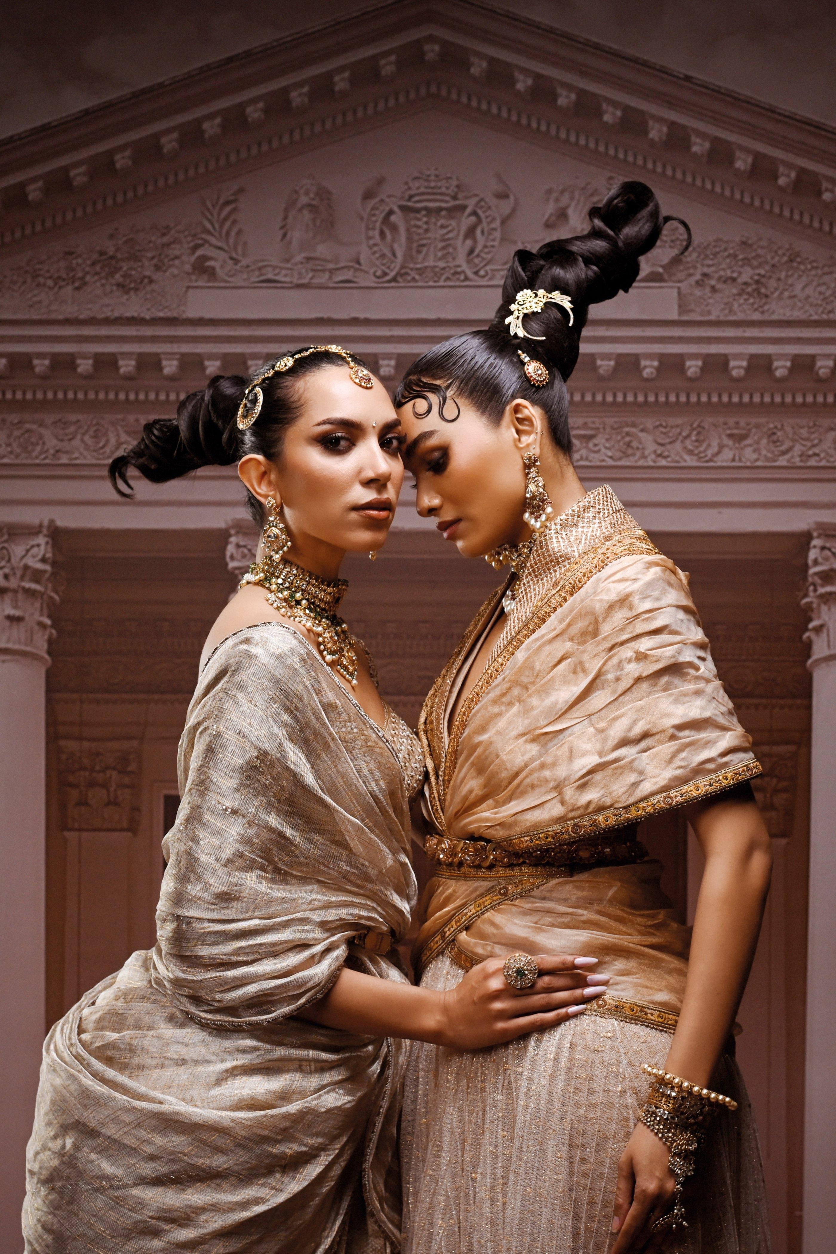 Models in Tarun Tahiliani's signature drapes at the Hyderabad showcase