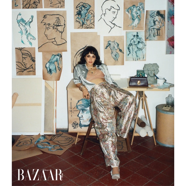 Shirt; pants; J’Adior pumps; Médaillon necklace; and Dior Médaillon clutch, all Dior; bangles and ring, Outhouse Jewellery; and ring, Ambir Jewels