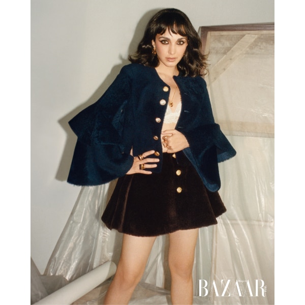 Fitted jacket; skirt; J’Adior sandals; Médaillon earrings and necklace, all Dior; and rings, Ambir Jewel