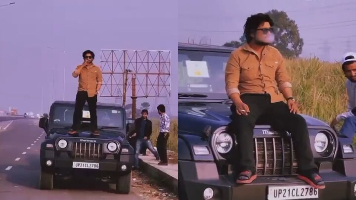 चलती THAR कार पर सिगरेट पीते हुए युवक ने किया स्टंट, 29 हजार रुपये से अधिक का कटा चालान UP Tak
