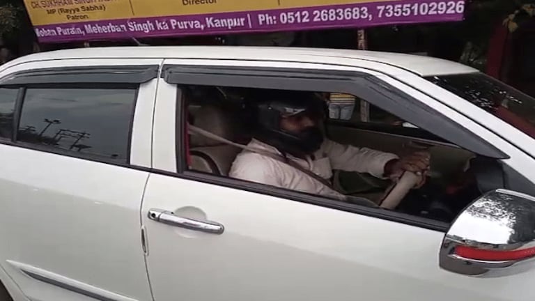 कानपुर के विशाल मिश्रा हेलमेट पहन कर क्यों चला रहे कार? शहर में हो रही खूब चर्चा UP Tak