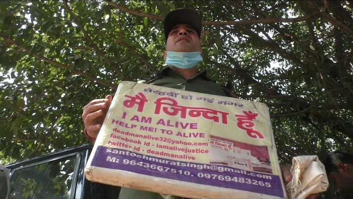 मैं जिंदा हूं! खुद को जीवित बताने के लिए सालों से चुनाव लड़ रहे काशी के संतोष, जानें कहानी UP Tak