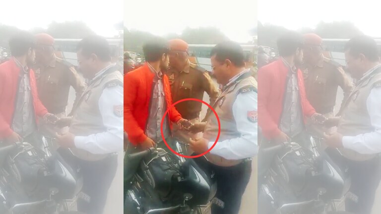 कानपुर: वीडियो ढंग से बनाने के लिए ट्रैफिक पुलिस ने युवक के हाथ में दिया तमंचा? की गाली गलौच UP Tak