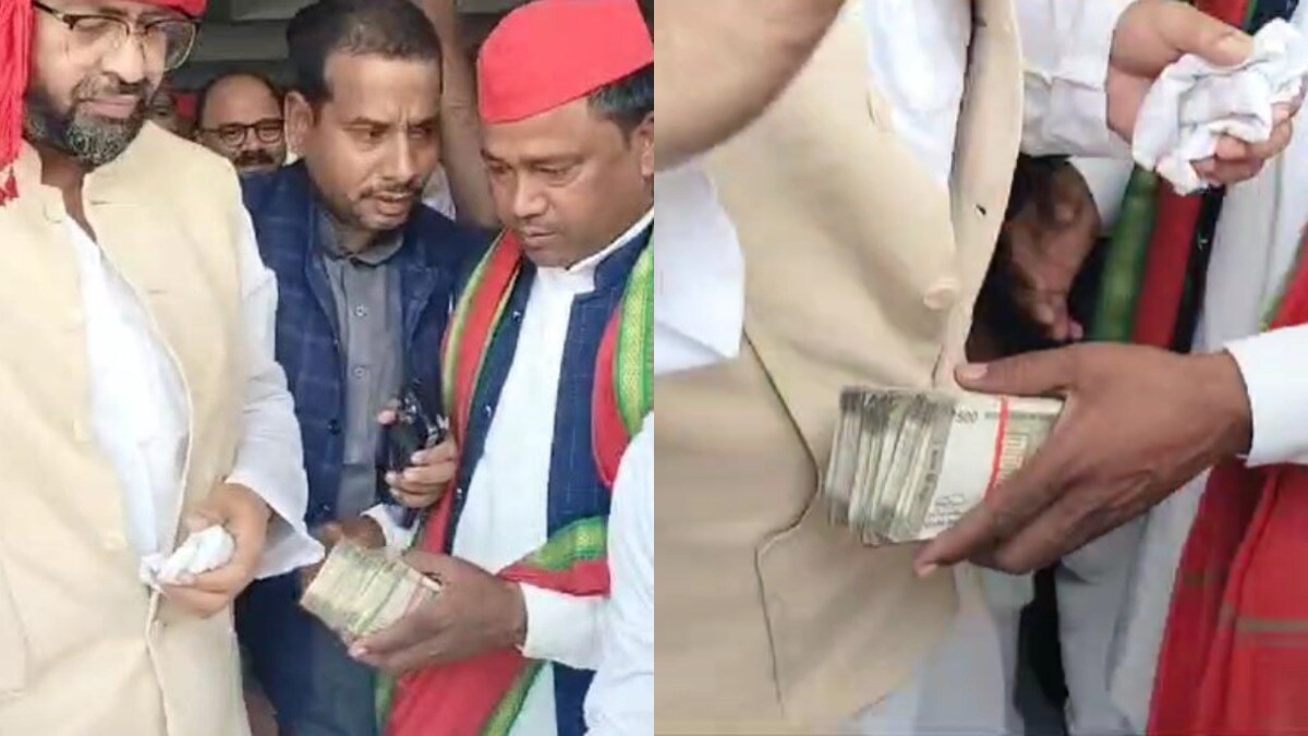सुल्तानपुर सपा प्रत्याशी बांट रहे नोटों की गड्डियां! बोलें- लोकतंत्र बचाने के लिए मिल रहे पैसे Sultanpur
