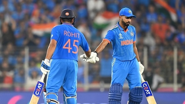 Rohit Sharma and Shreyas Iyer of India embrace during the ICC Men's Cricket World Cup India 2023 between India and Pakistan