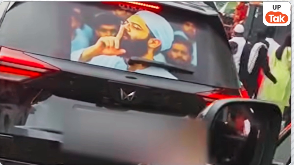 अतीक के बेटे उमर अहमद की मुंह पर उंगली रखने वाली फोटो गाड़ी पर लगी दिखी, कौन था जो ये कार चला रहा था?