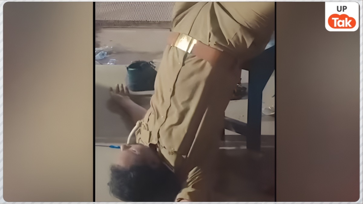 जमीन पर सिर, आसमान में पैर... चित्रकूट में हाइवे किनारे नशे में धुत यूपी पुलिस जवान का वीडियो वायरल, SP ने किया निलंबित