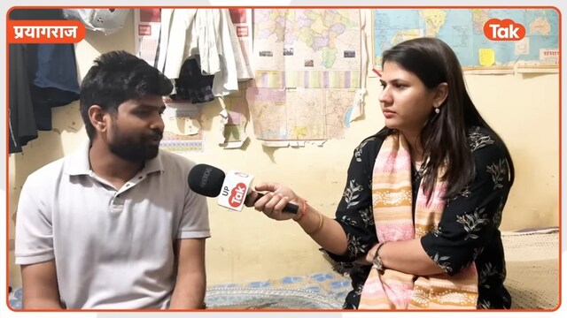 तस्वीर में यूपी Tak रिपोर्टर सरिता तिवारी और अभ्यर्थी सत्येंद्र