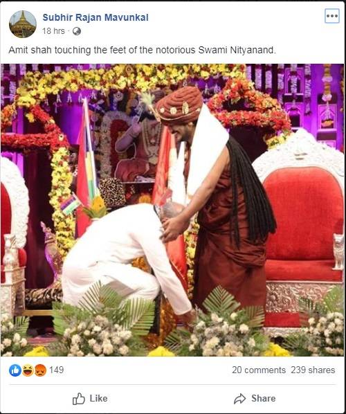 amit-shah-touching-feet-swami-nityanand-_-facebook-search_121019062143.jpg