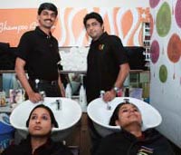 Bhalchandra and Bopaiah in their salon