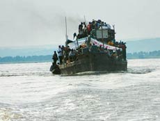 The Kinshasa-Brazaville ferries are fi lled to the brim with people, animals and smuggled produce.