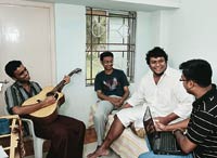 Students chilling out in their hostel after a hard day