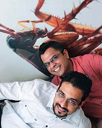 Kartik Iyer, 33 and Praveen Das (in white), 32