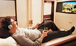 A private suite, a designer bed, sipping wine as you watch a film. Life at 30,000 feet just got better