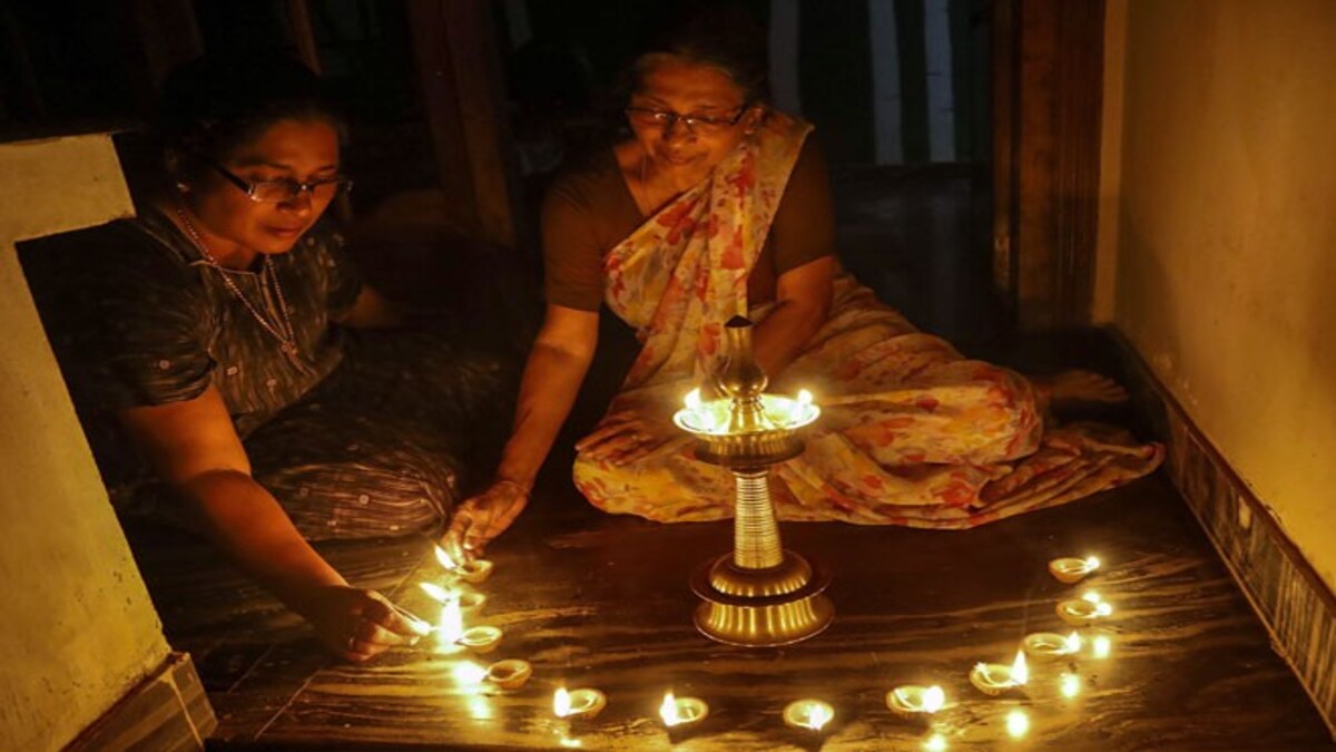 coronavirus highlights india lights diyas candles during 9 min light out to fight covid 19