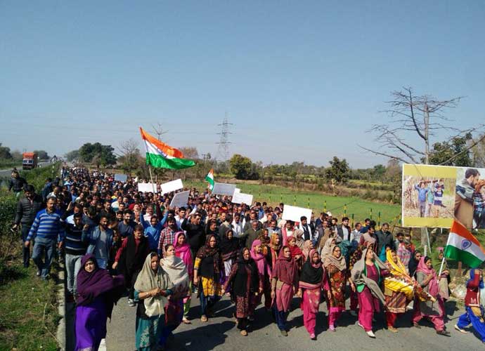 People marched with the National Flag in support of those accused of raping and killing an 8-year-old girl in Jammu's Kathua. People marched with the National Flag in support of those accused of raping and killing an 8-year-old girl in Jammu's Kathua.