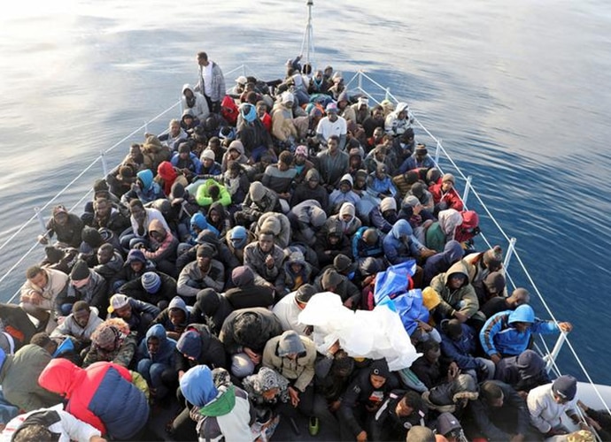 migrants_070618101932.jpg migrants_070618101932.jpg