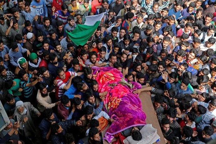 Kashmir sees crowds pouring out for militants' funerals. The funeral of Ishrat Muneer was a quiet affair. 