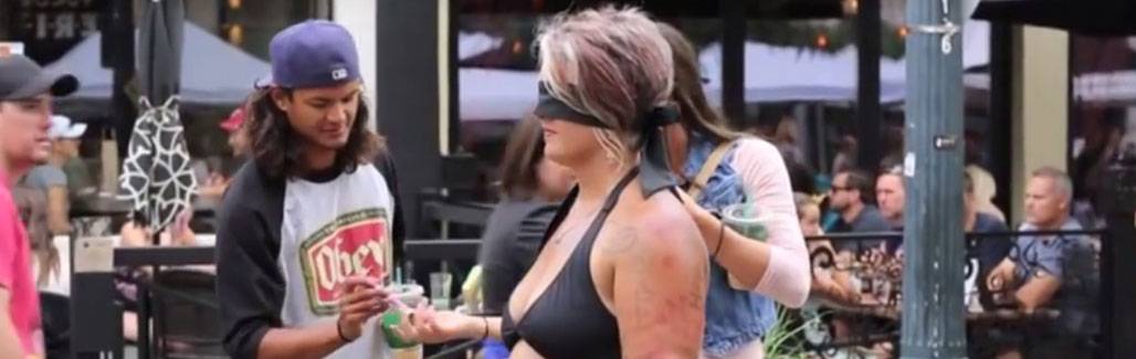 Why this woman stripped and wanted people to draw hearts on her