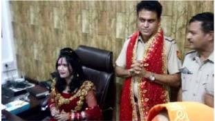 अपराधी कौन है ? राधे मां, SHO या वो तस्‍वीर...