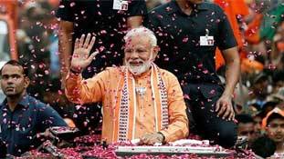 प्रधानमंत्री मोदी के वाराणसी रोड शो की तस्‍वीरों के मायने
