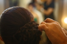 Model getting her Wedding makeup