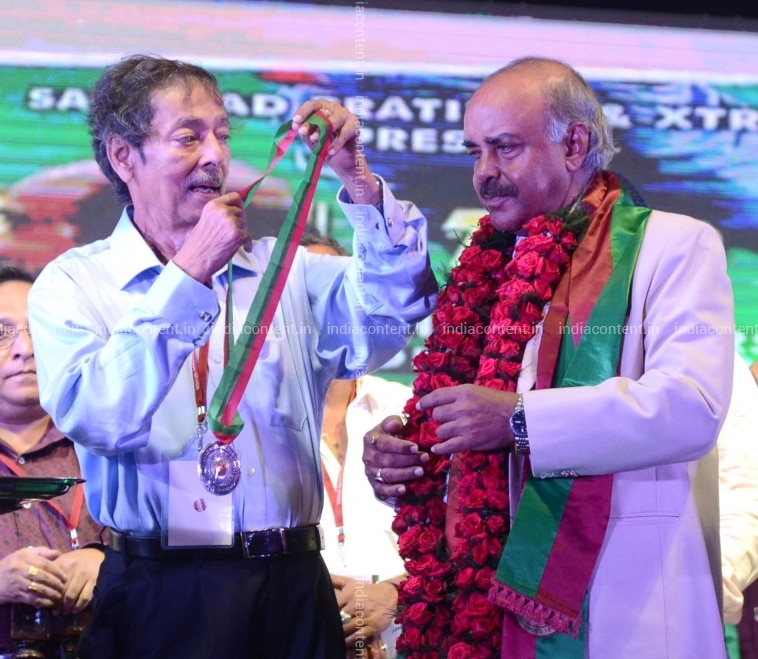 Buy New Delhi Mohun Bagan Secretary Anjan Mitra Felicitates Veteran Footballer Pradip Choudhury With Mohun Bagan Ratna During Mohun Bagan Day Celebrations In Kolkata On July 29 2018 Photo Ians Pictures Images