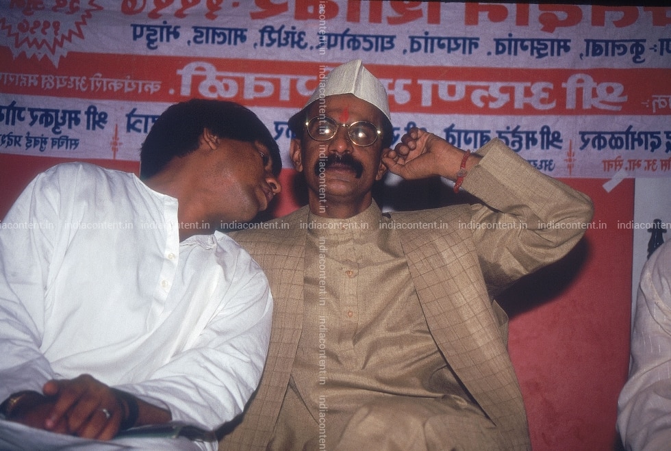 Buy Arun Gawli with a supporter at an official function Pictures