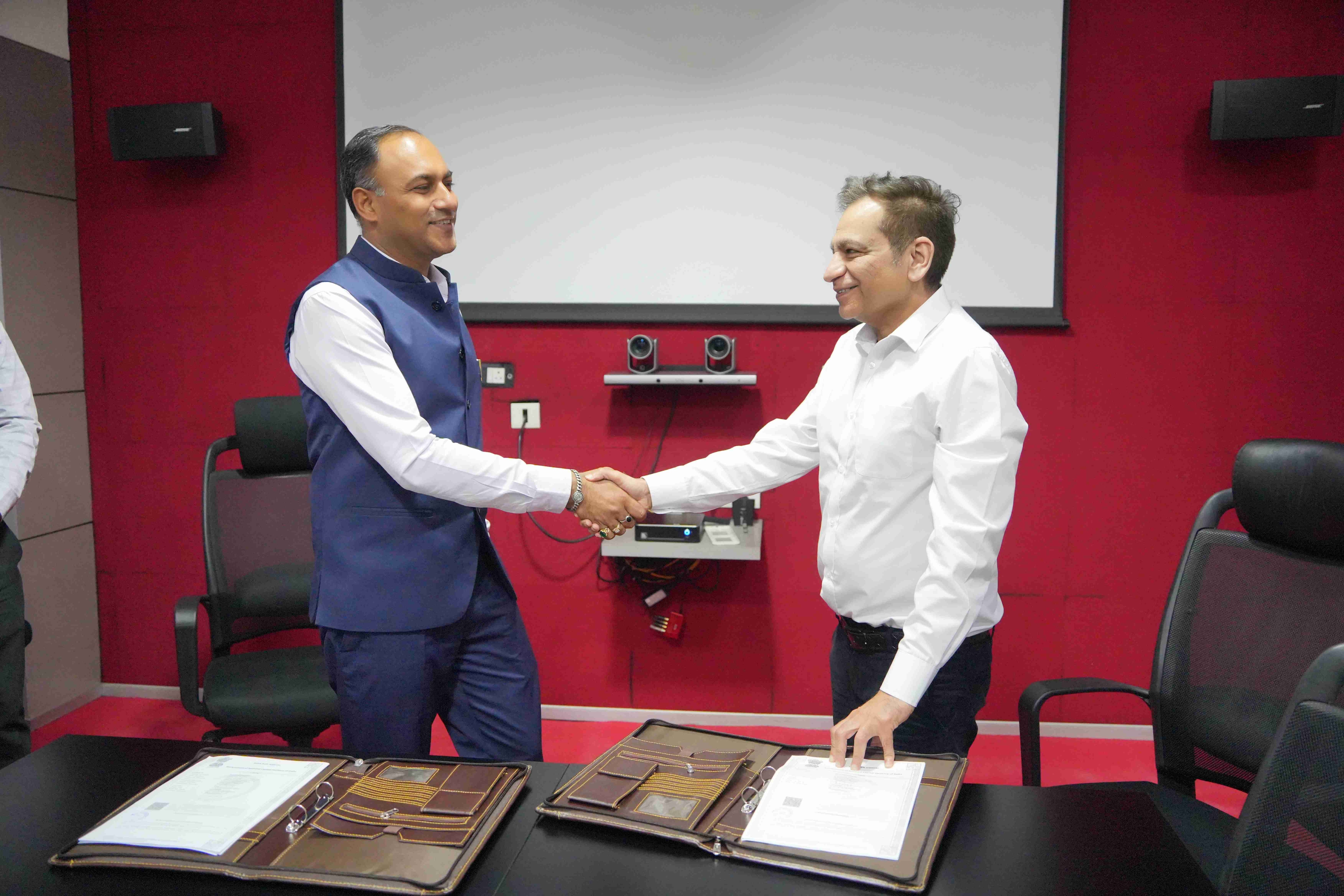 Sealing a Deal: Mr. Dinesh Bhatia, Group CEO, India Today Group and Dr. Mayank Agarwal, Managing Director, IIMT Group of Colleges