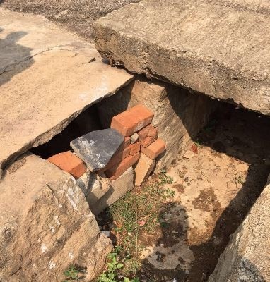 drain under her gate