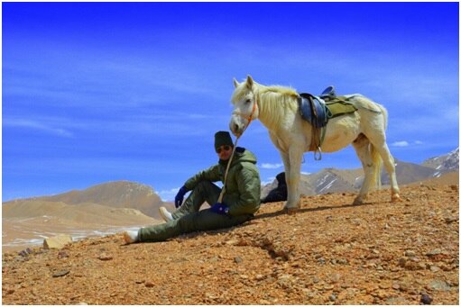 ‘top of the world’ at 19500 feet is a resting place for the young AC(Vet) and his pony,