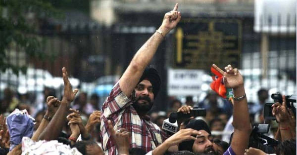 Navjot Singh Sidhu, a leader in India's main opposition BJP party, shouts slogans during an anti-government protest in New Delhi
