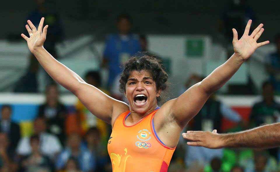 पदक जीतने की खुशी. Photo: Reuters