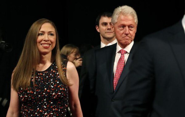 Chelsea Clinton and her father, former U.S. president Bill Clinton, arrive for the third and final debate between Republican U.S. presidential nominee Donald Trump and Democratic nominee Hillary Clinton in Las Vegas