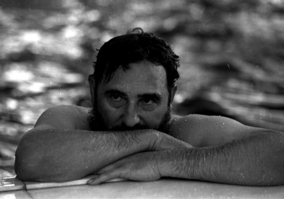 File photo of Fidel Castro relaxing a swimming pool in Romania