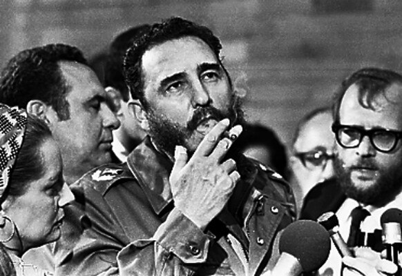 File picture of Fidel Castro smoking a cigar during interview with the press in Havana