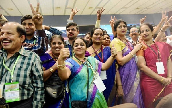 Bengaluru: ISRO scientists and other officials celebrate the success of Mars Orbiter Mission at MARS Orbiter Command Network complex in Bengaluru on Wednesday. PTI Photo by Shailendra Bhojak (PTI9_24_2014_000055B)